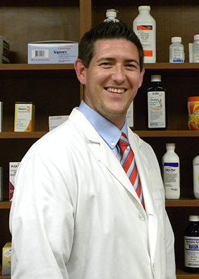 Picture of a male Taylor Regional Outpatient Pharmacist smiling.